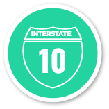 A green circular icon with a white border featuring 